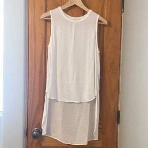 A cloth and stone low, high tank.